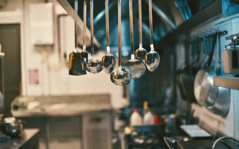 Commercial kitchen interior showing cooking line and exhaust hood in South Jersey