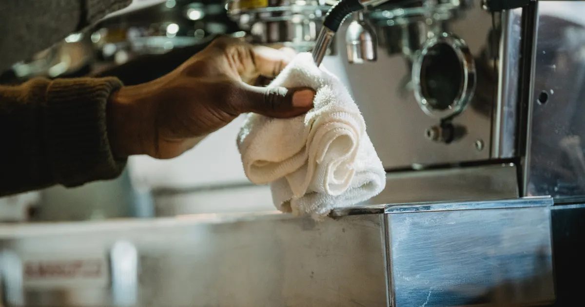 Commercial kitchen cooking equipment being cleaned in Millville NJ restaurant
