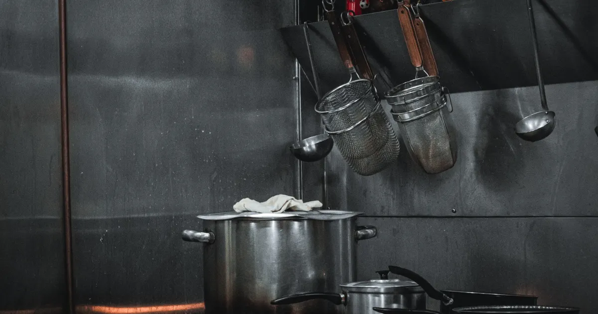 Commercial kitchen exhaust system with grease filters requiring replacement in Millville NJ
