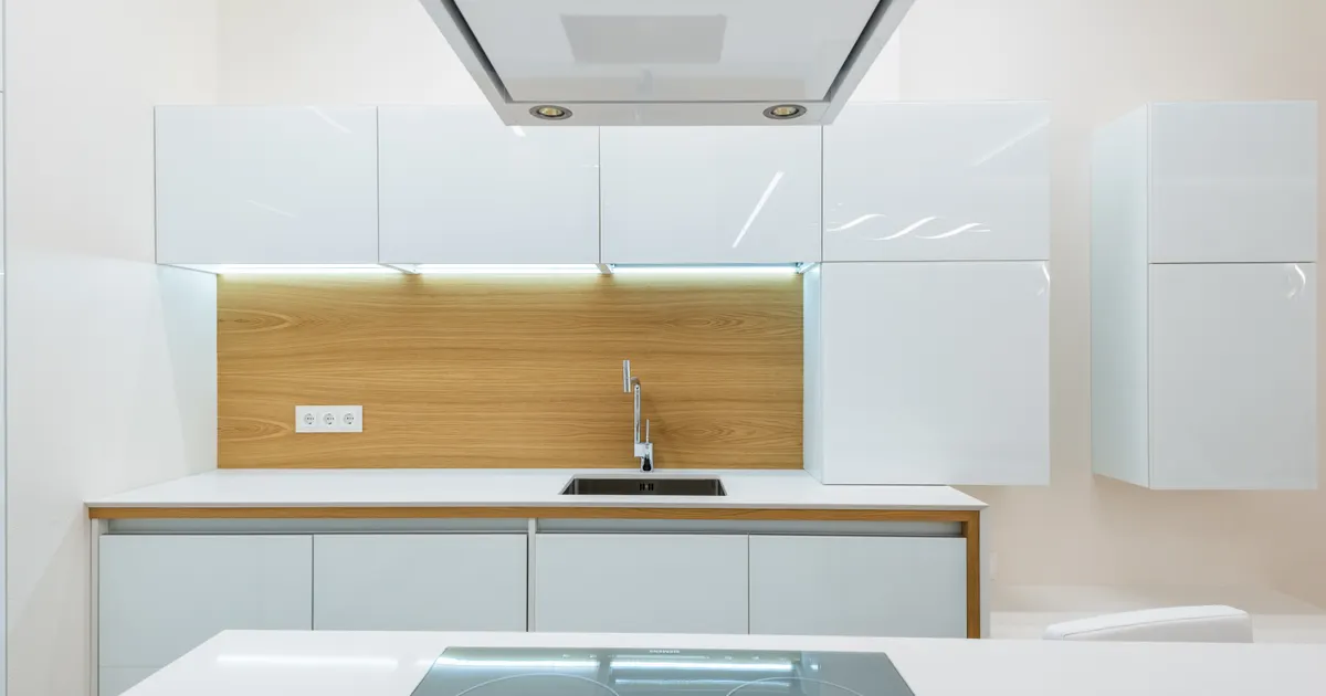 Stainless steel commercial kitchen hood above cooking line in Millville NJ restaurant